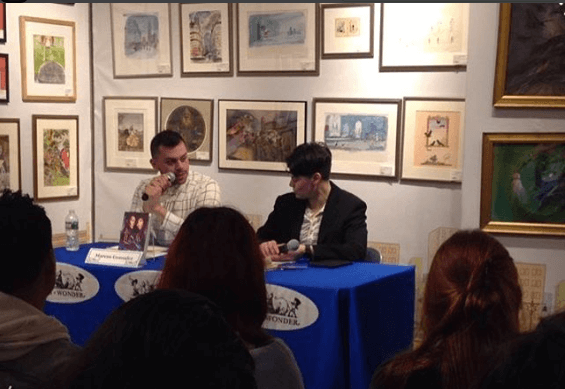 CUNY Humanities Alliance Fellow, Jenn Polish, at their book launch at Books of Wonder, in conversation with Graduate Center peer and author, Marcos Gonsalez. 